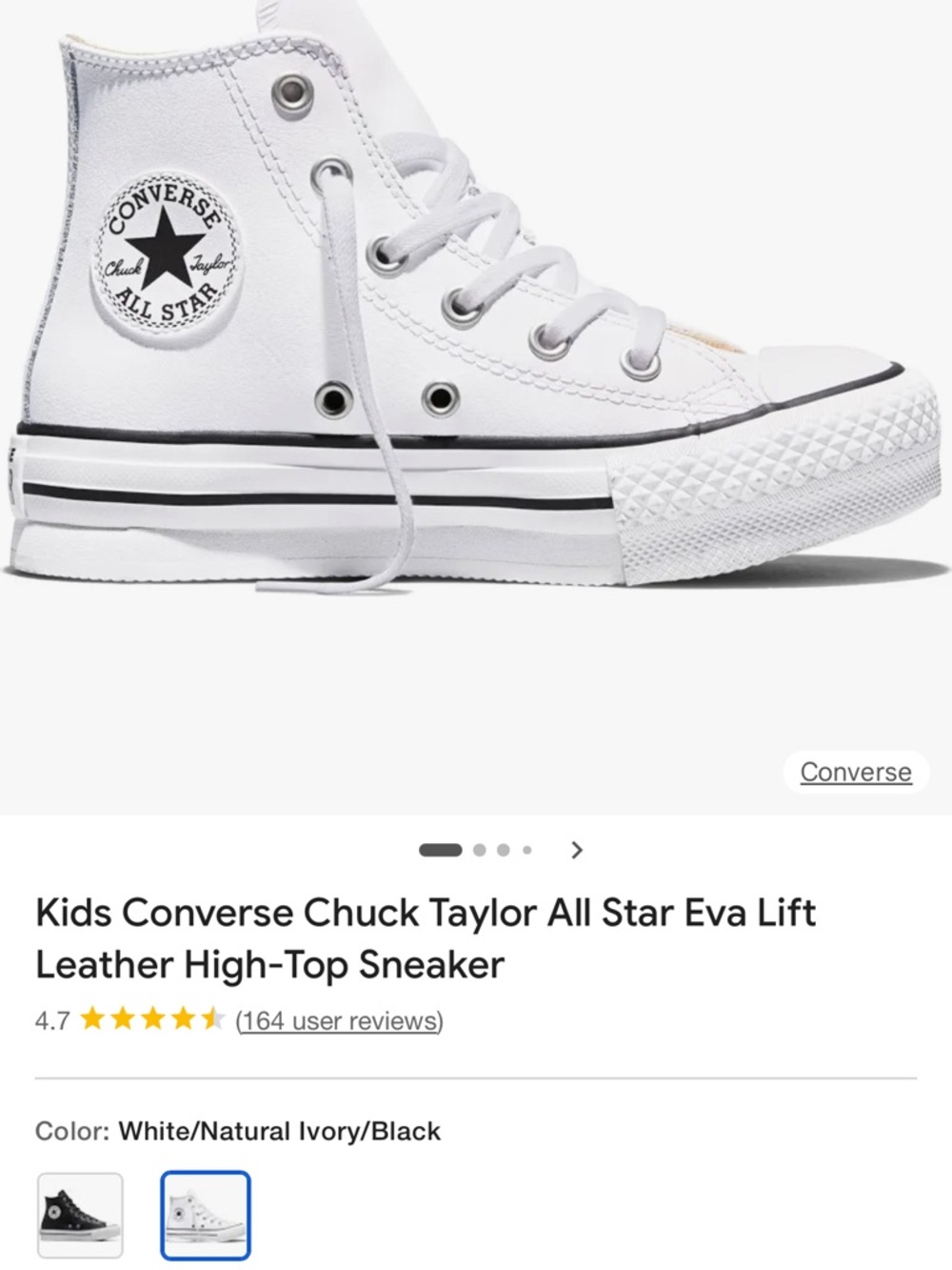 Converse White High-Top Canvas Sneaker with Black Trim